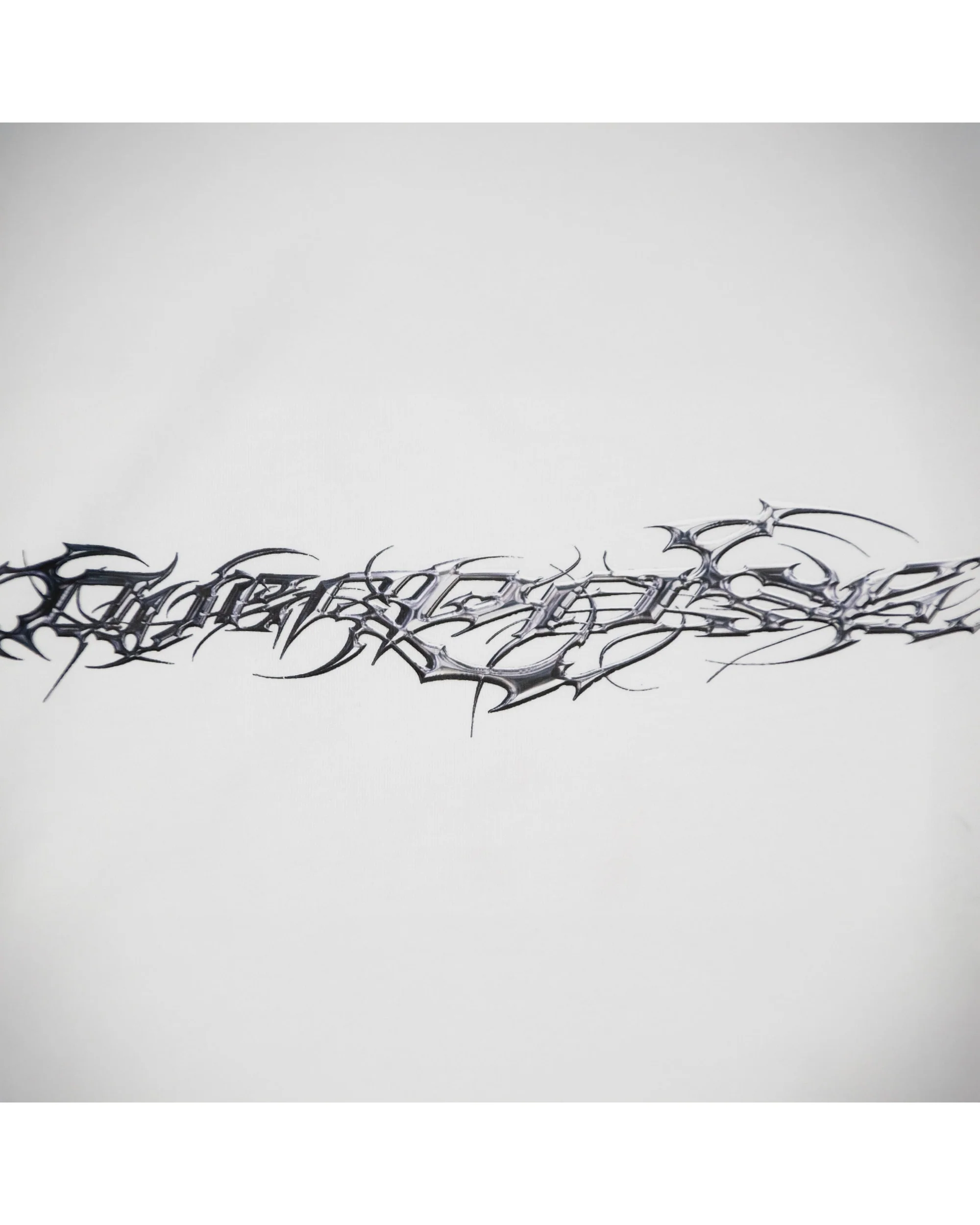 "TRIBAMETAL" LOGO TRNSFRMR L/S - ANGEL - Image 9